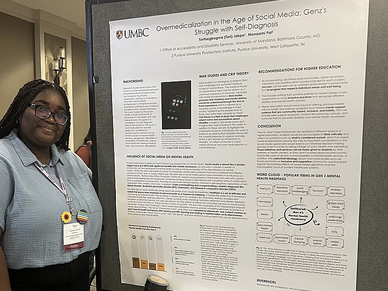 A young Black woman stands proudly beside her academic research poster presentation at a conference. The poster is titled “Overmedicalization in the Age of Social Media: Gen Z’s Struggle with Self-Diagnosis,” authored by Toritsegbogwa (Tori) Jakpa and Maanami Pal.
